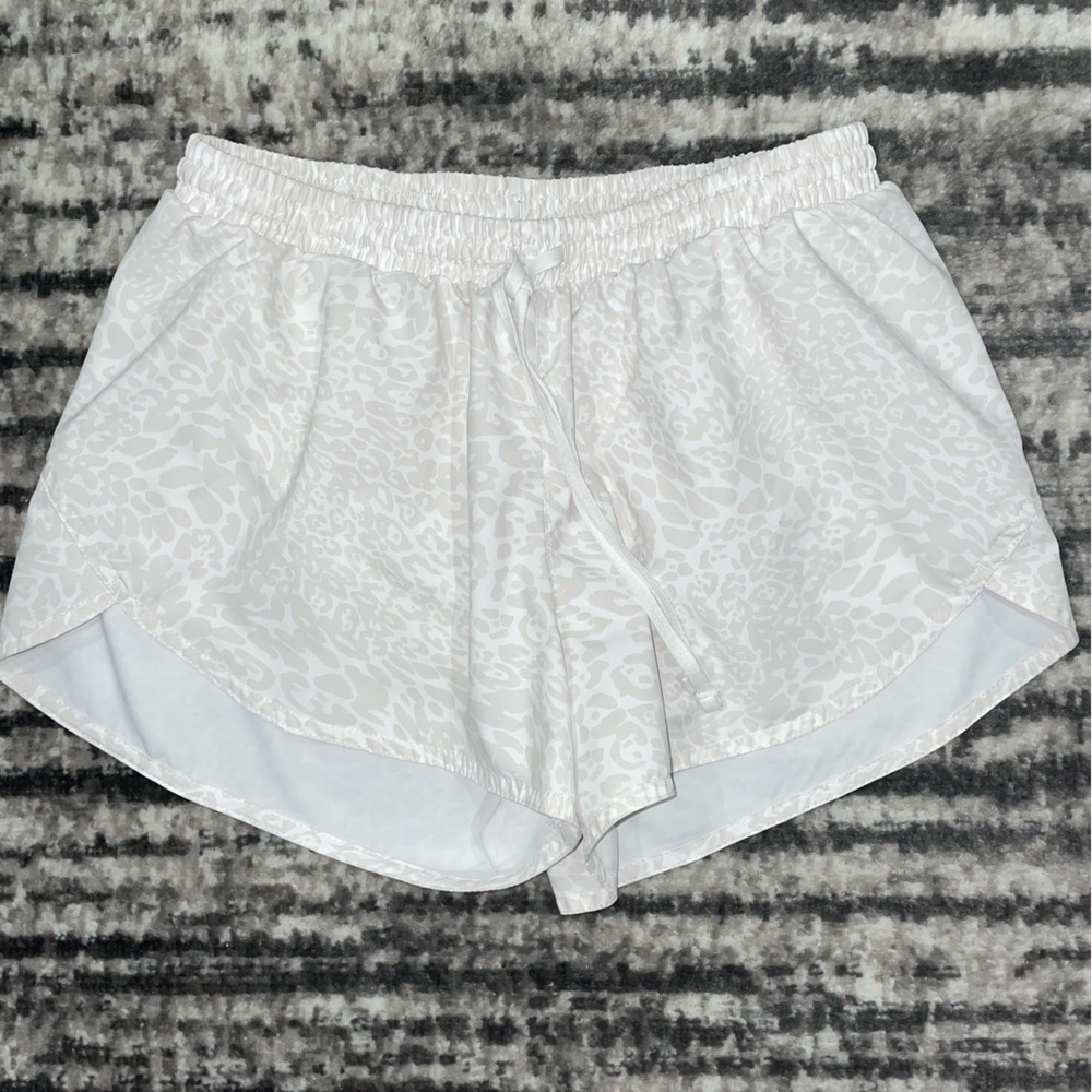White animal print athletic shorts